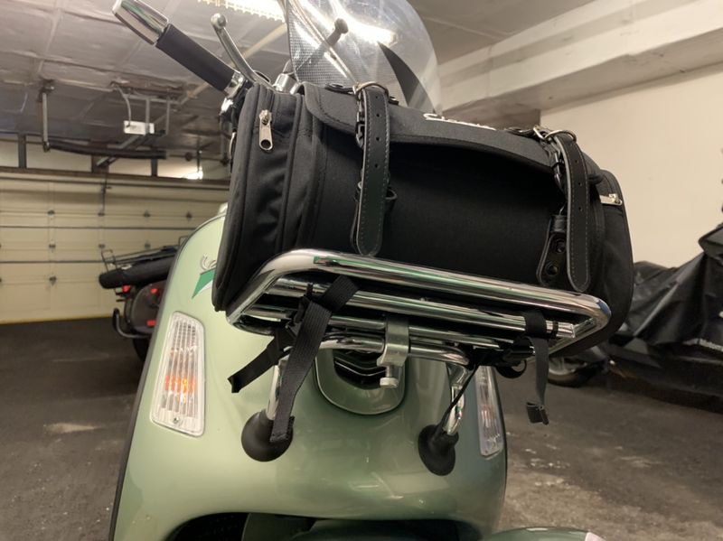 Modern Vespa What do you use to keep the back/front rack in place?