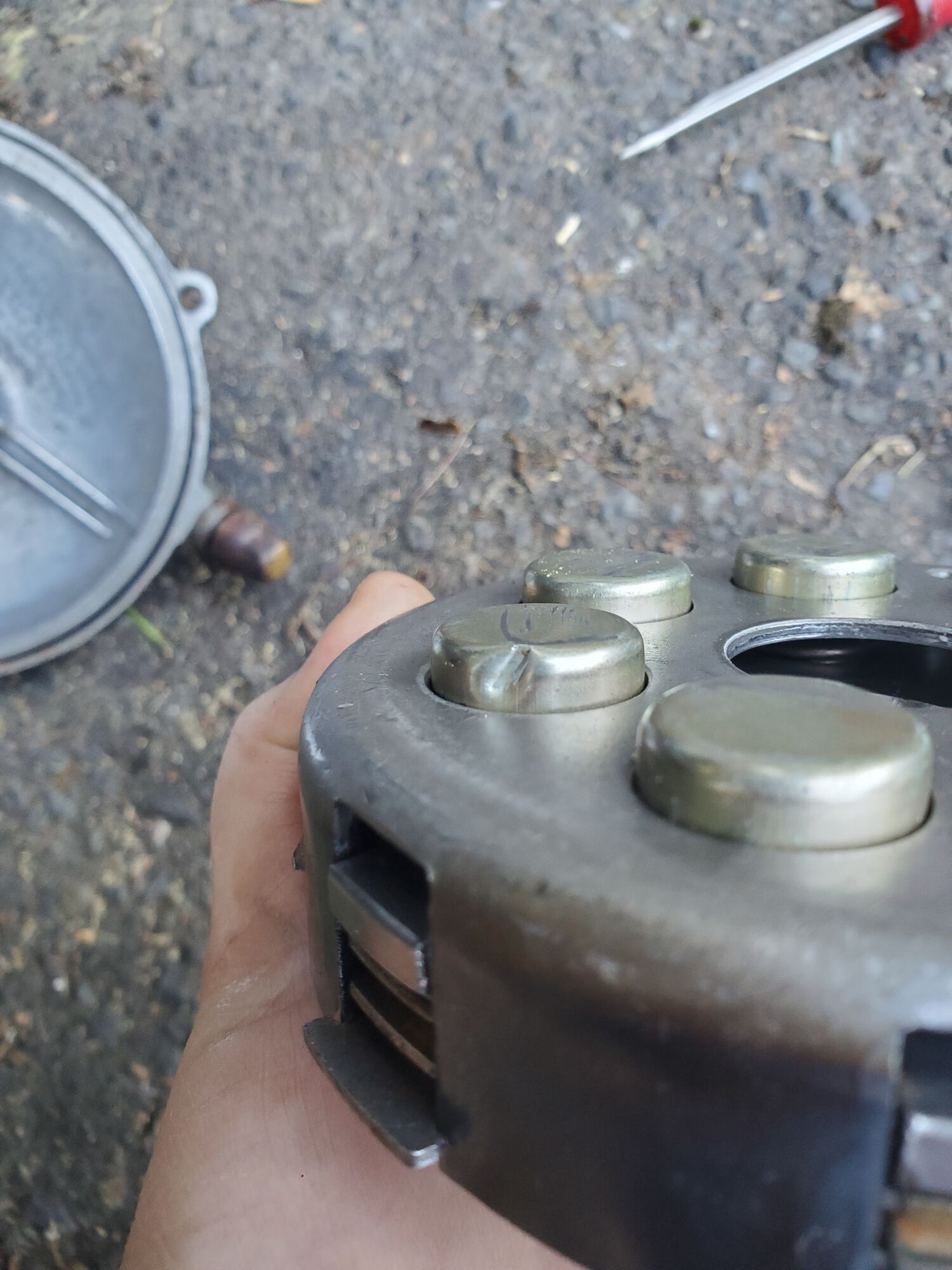 Inspected the clutch. Clearly something hit it. I also found a brass flake sitting on the clutch. No photo. But it didnt come from the plunger or the bush.