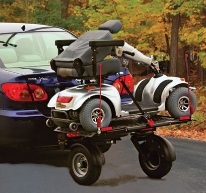 Wheel assisted hitch carrier