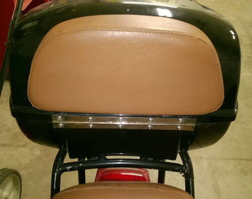 Note the top red "light" is only a reflector so I added the lower light. It's a truck side marker LED and I wired it into the brake light. In the second picture you can see the hinge had broken so I replaced it with a piano hinge.