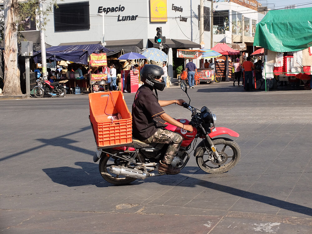 Delivery Run: Nearly every rider I saw in Guadalajara, was helmeted, in stark contrast to Chapala