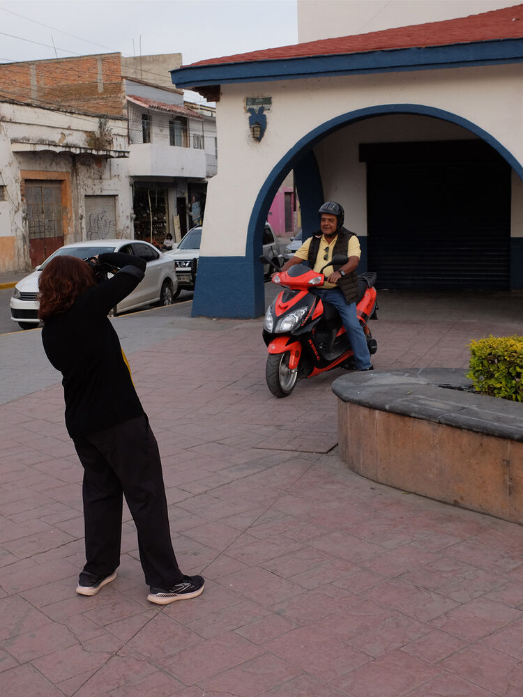 Older scooter-dude poses for Le Wife.