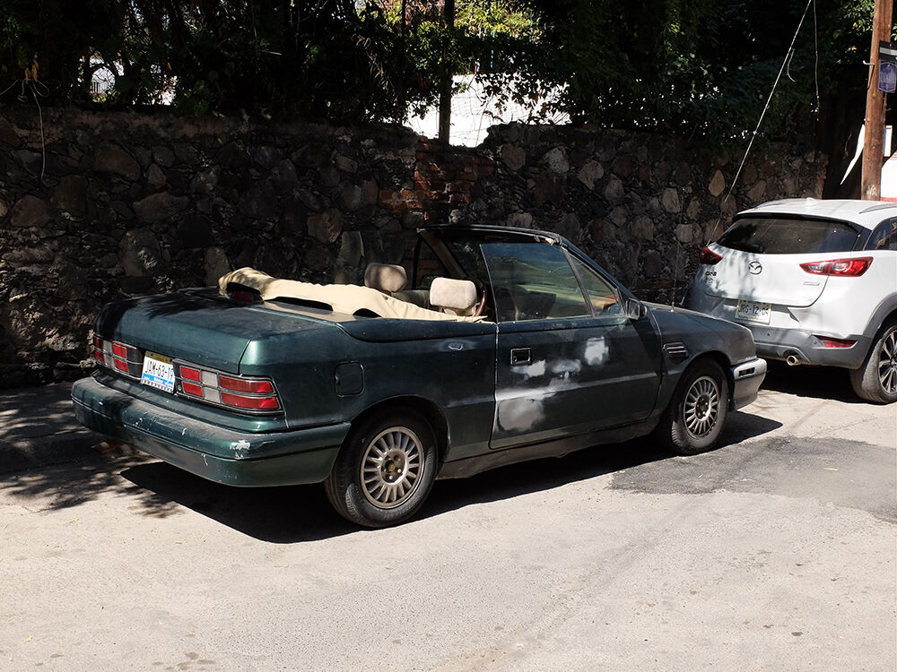 On All Fours, I: Other than a late-model Miata, I think this was the only ragtop I saw in all of Chapala. Go figure.