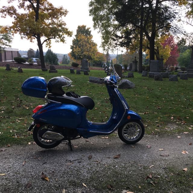 Another stop at a cemetery. I debated about getting the top case, but am glad I did. Sure wish the freakishly large Schuberth M1 helmet would fit though. It doesn't.