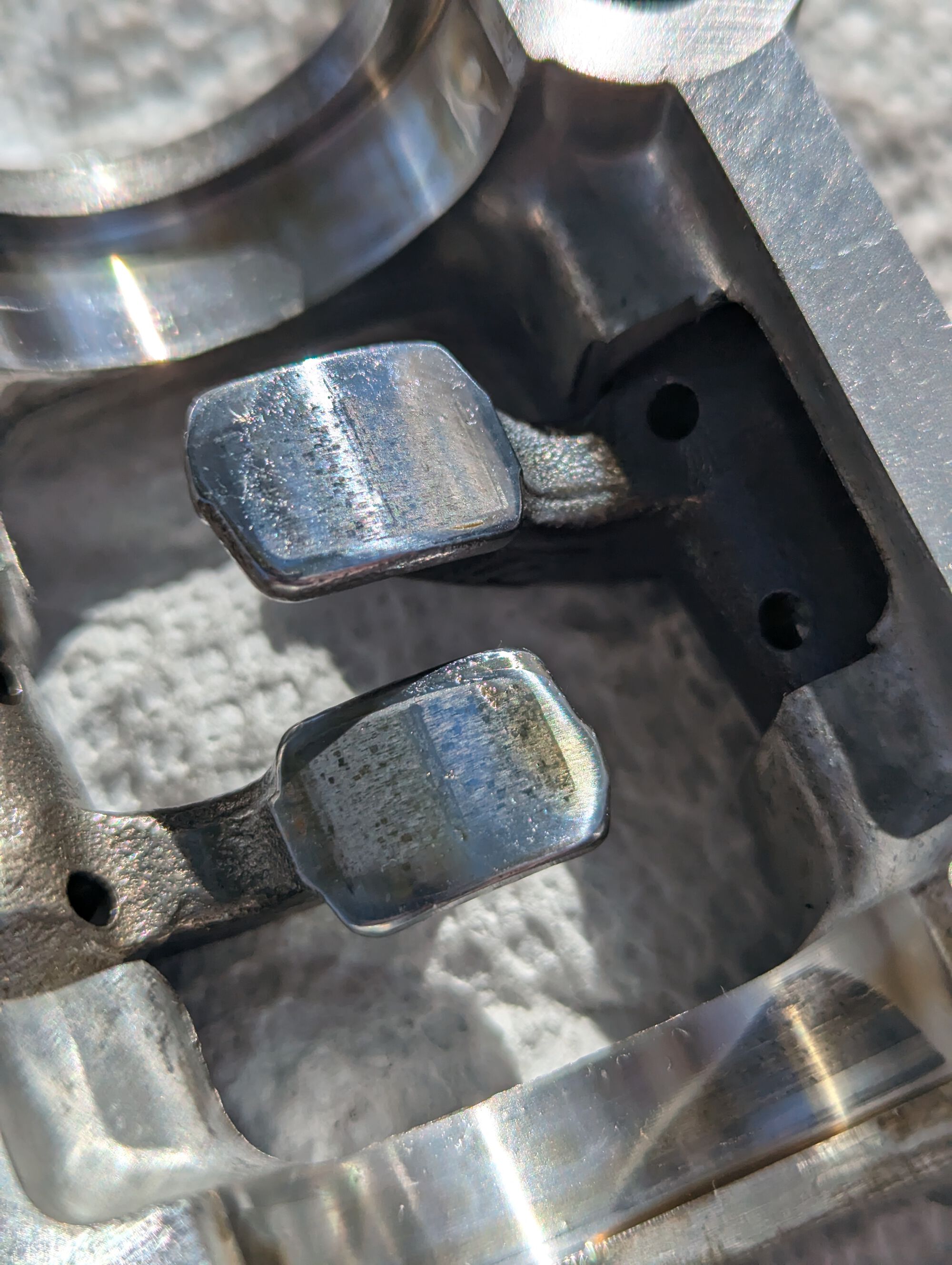 The camera makes the rockers look worse, but I don't like the pitting.