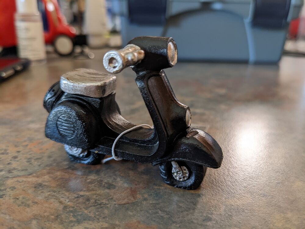 Pretty sure this an SEA jobbie; the silver seat and handgrips are a new twist for me. The Bajaj spare mount is a bit sus as well.