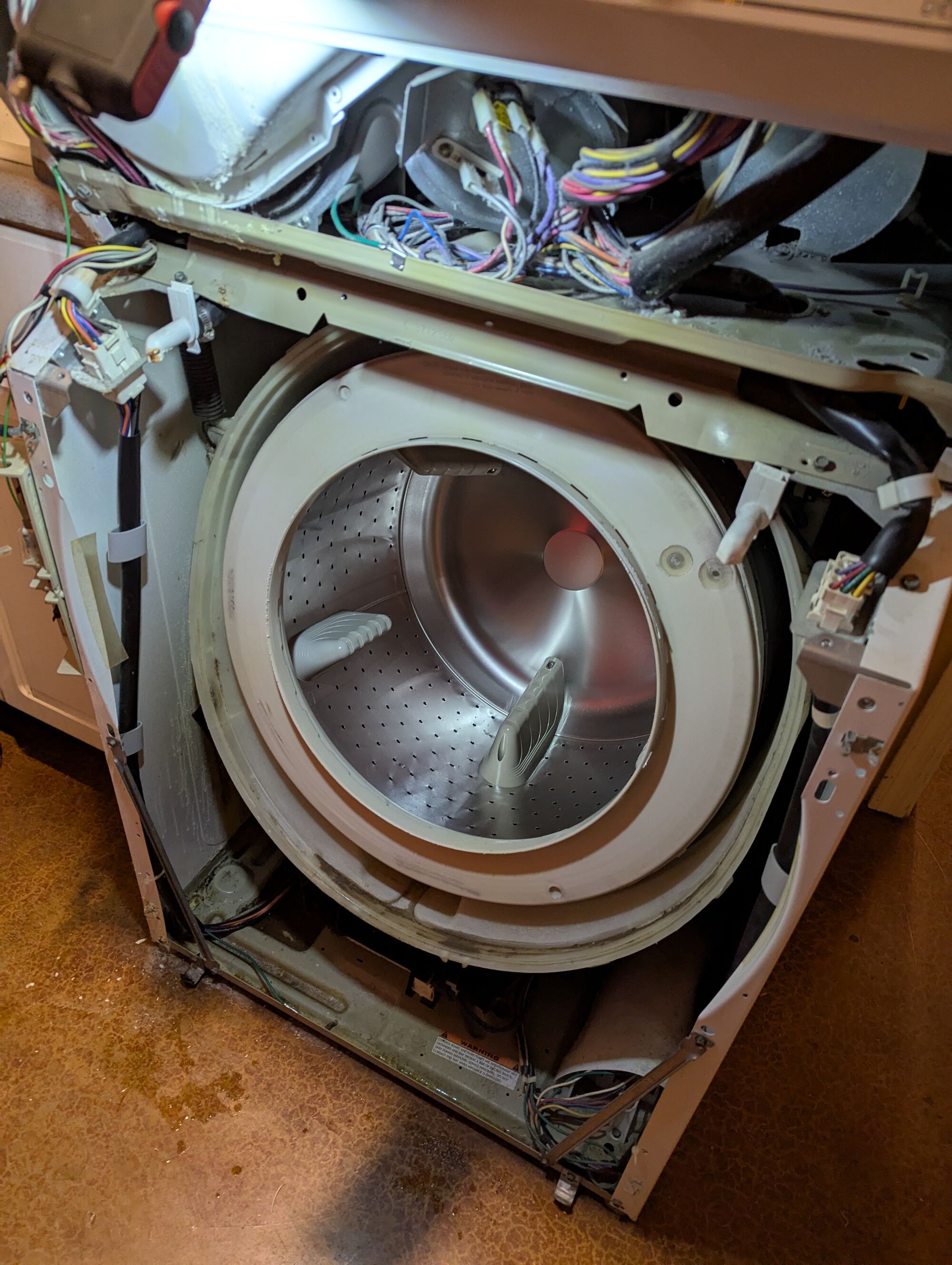 Disassembling it to pull the wash drum.