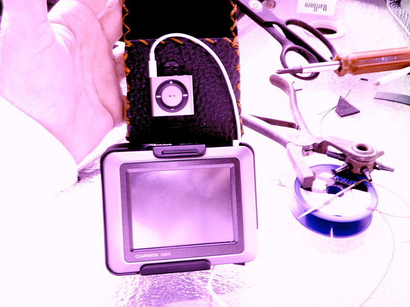 Made a nice leather mount over the plastic for the ipod.