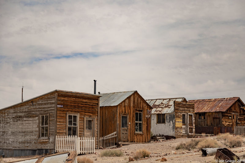 The mining buildings included a saloon, general store, and tent cabins.