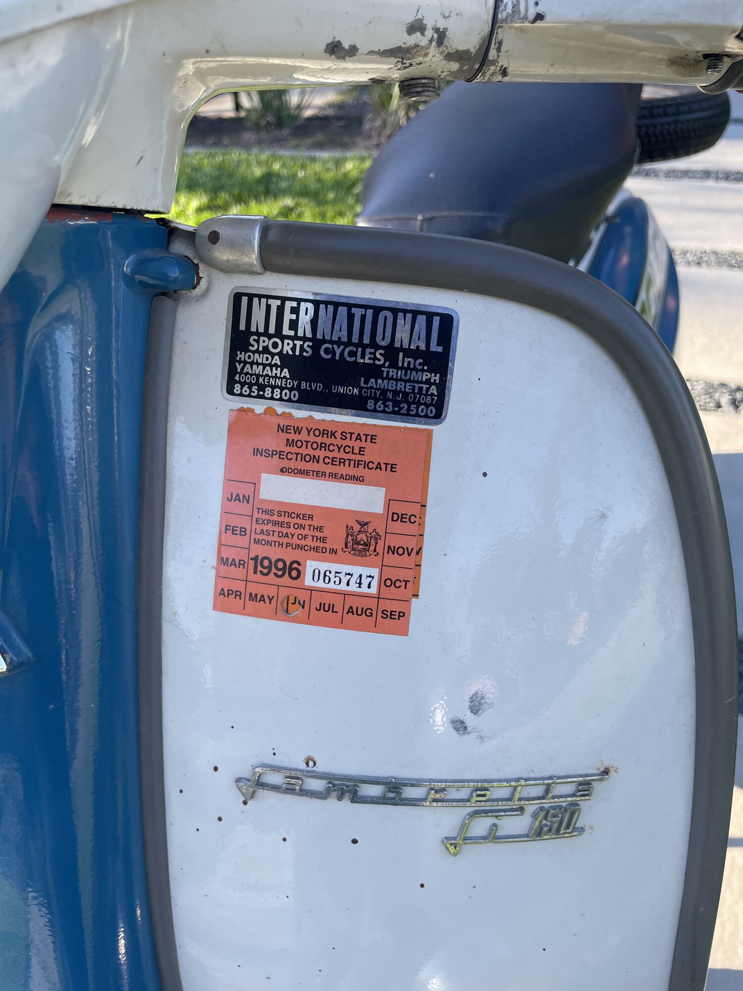 Dealer stickers and auction era inspection tag.