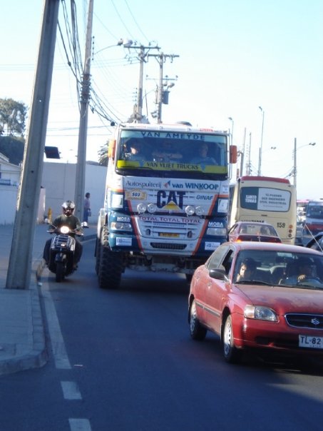Rally Dakar racing truck vs. Vespa