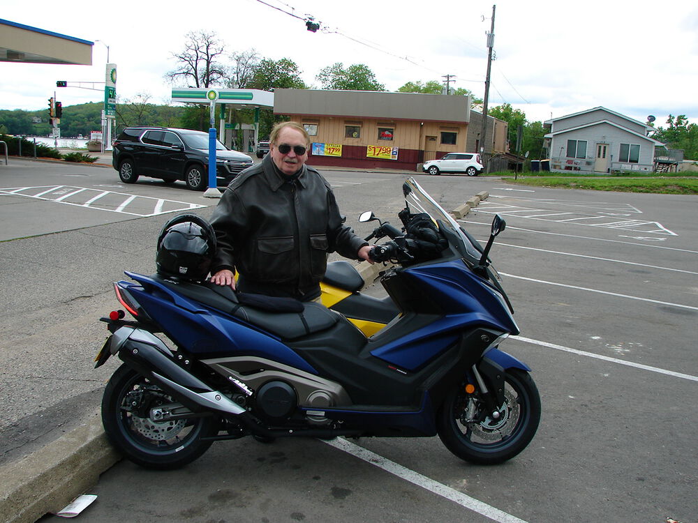 Here with my Kymco 550 - a real rocket scooter.