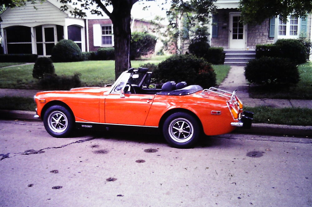 My 1974 MG Midget, I was over the moon thinking I was cool driving that Midget.