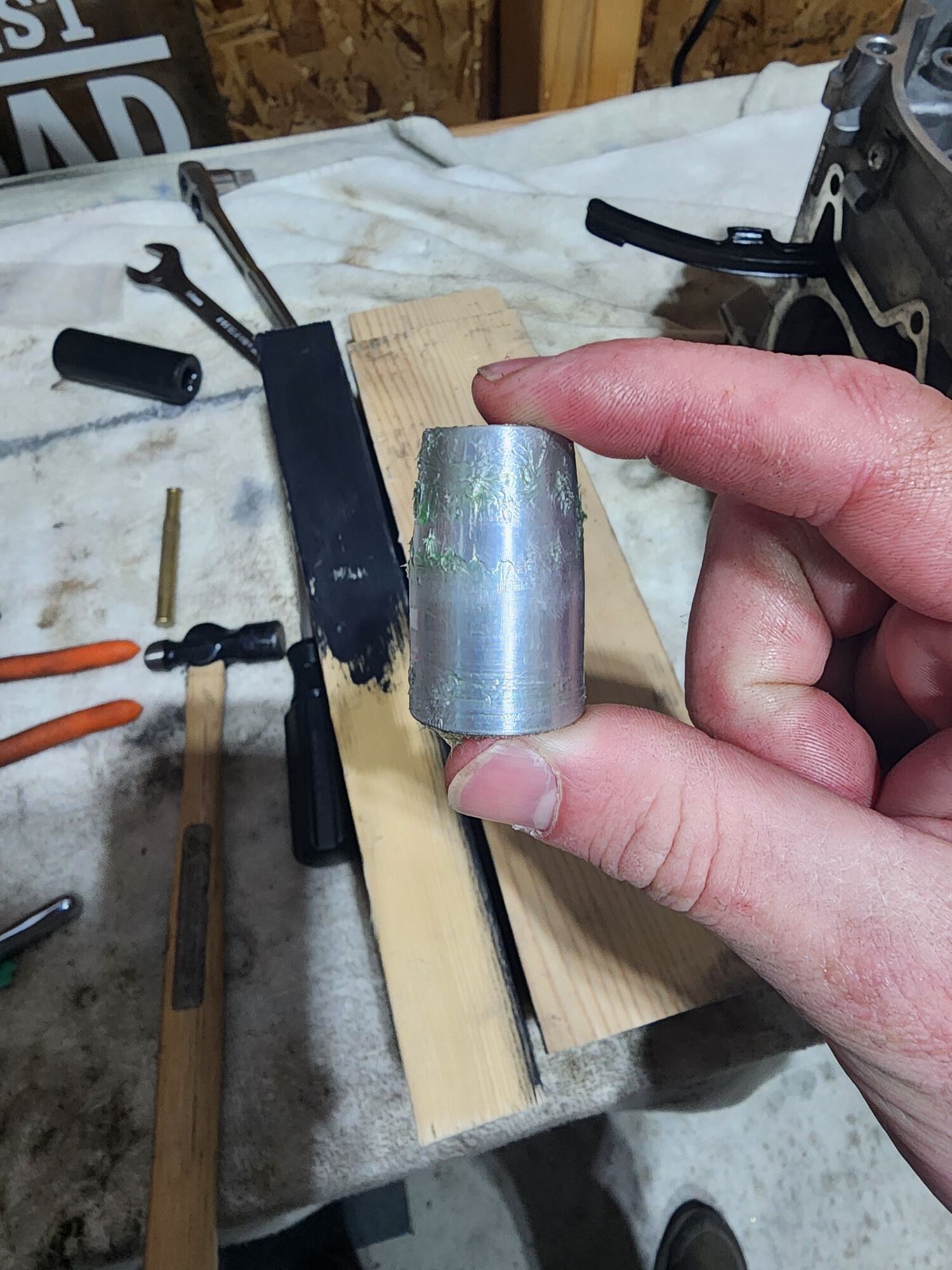 The "tool". Made out of aluminum and put on a lathe to get the correct dimensions.