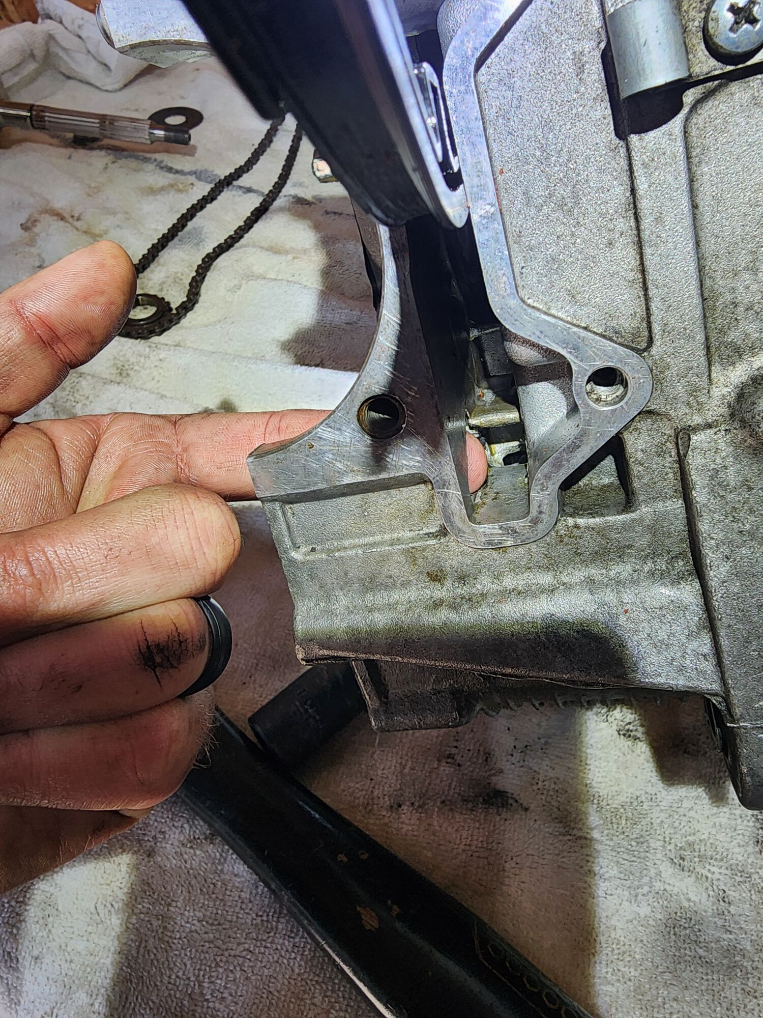 Case halves split and finger in hole.