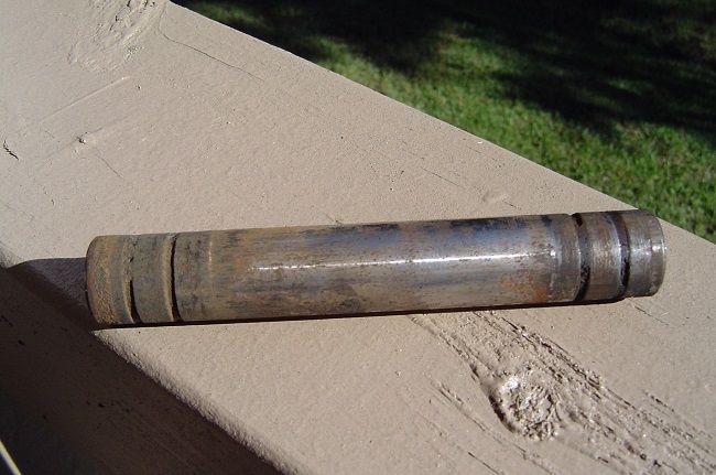 This is the bushing after less than a year. I know that someone drilled the bolt and installed a grease fitting. I'm not going to because this was not that hard and I feel that just squirting grease in isn't as proactive and excess grease collects grit.