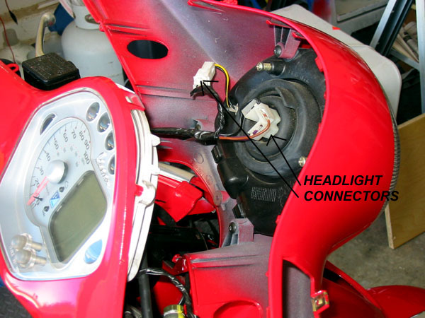 Cover removed, showing headlight connectors