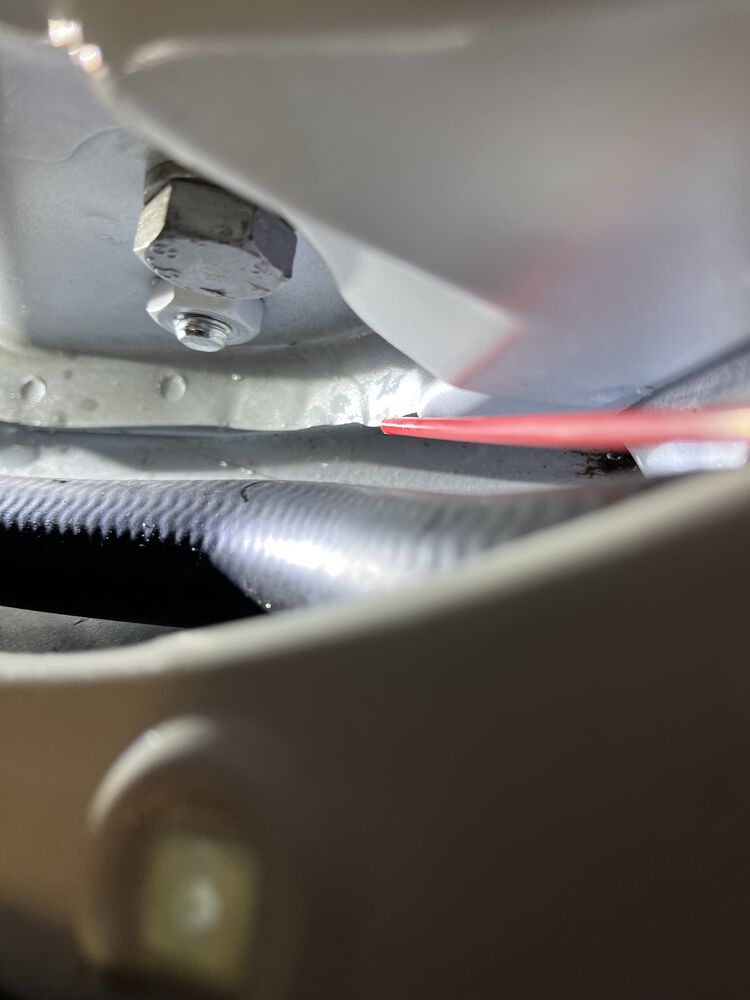 WD40 in the rocker pinch-weld after cleaning up coolant