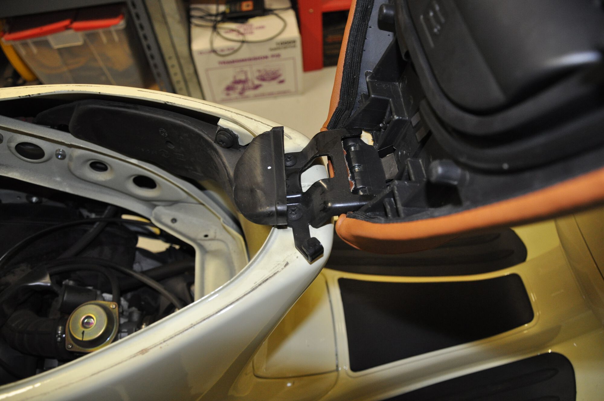 Simple enough to remove the seat, just two screws...