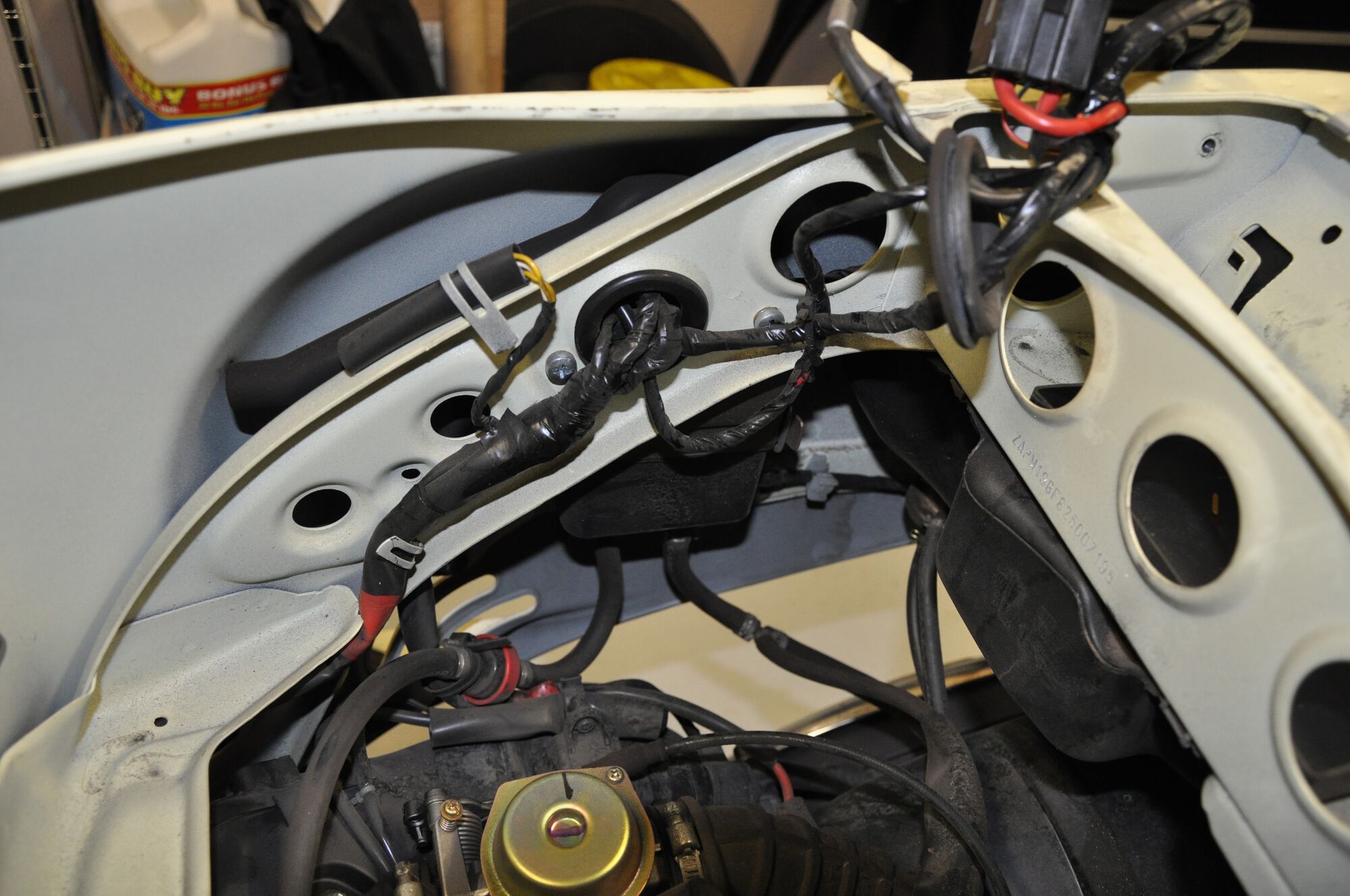 I like to take lots of pictures of the wiring harness.  Helps me remember where everything was routed so I can get it all back nice and neat.