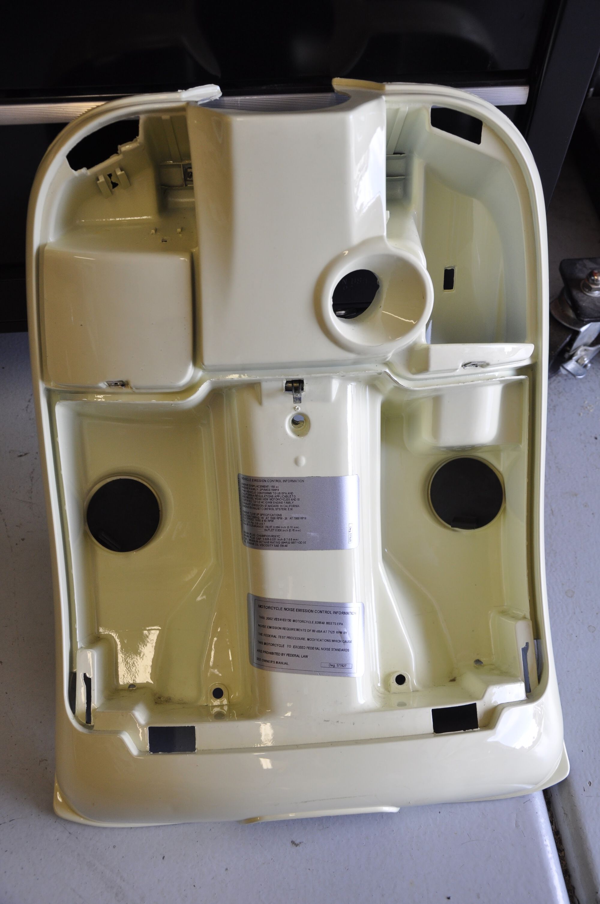Glove compartment removed from the frame and the door removed.