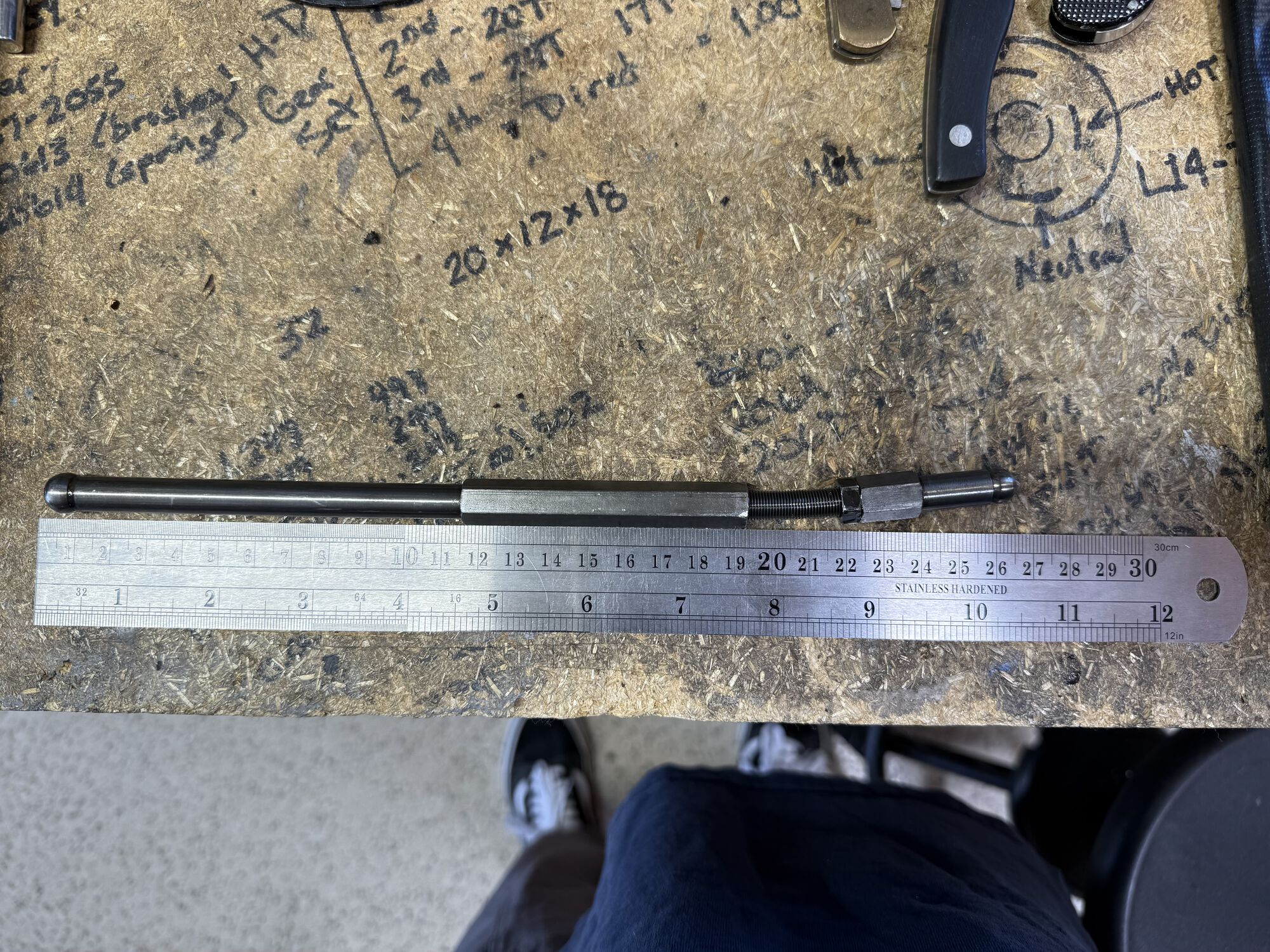 Bent pushrod. This probably got bent when the valves collided.