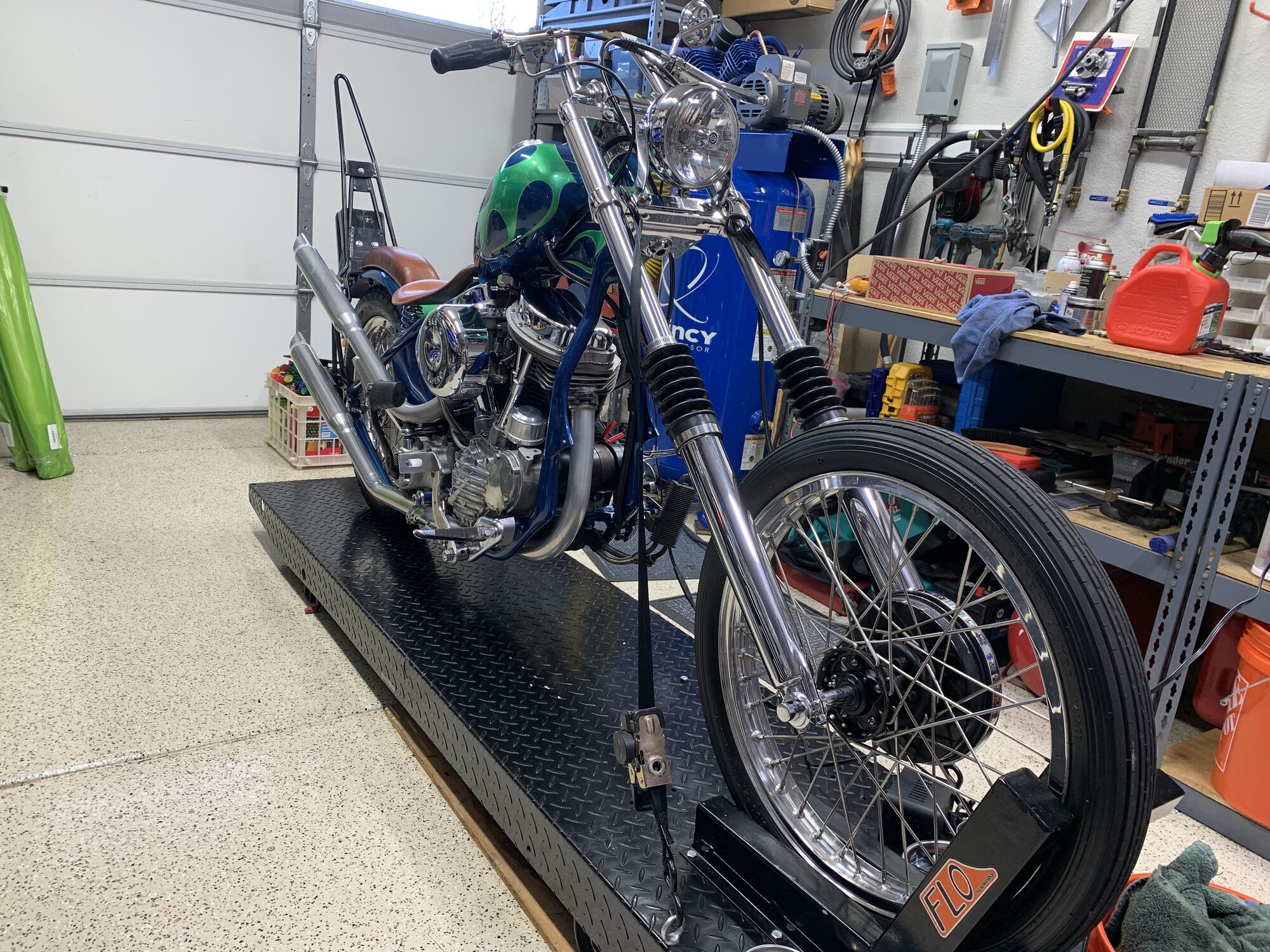 Fully lowered. There is a ramp that attaches at the back to make loading/unloading a breeze.