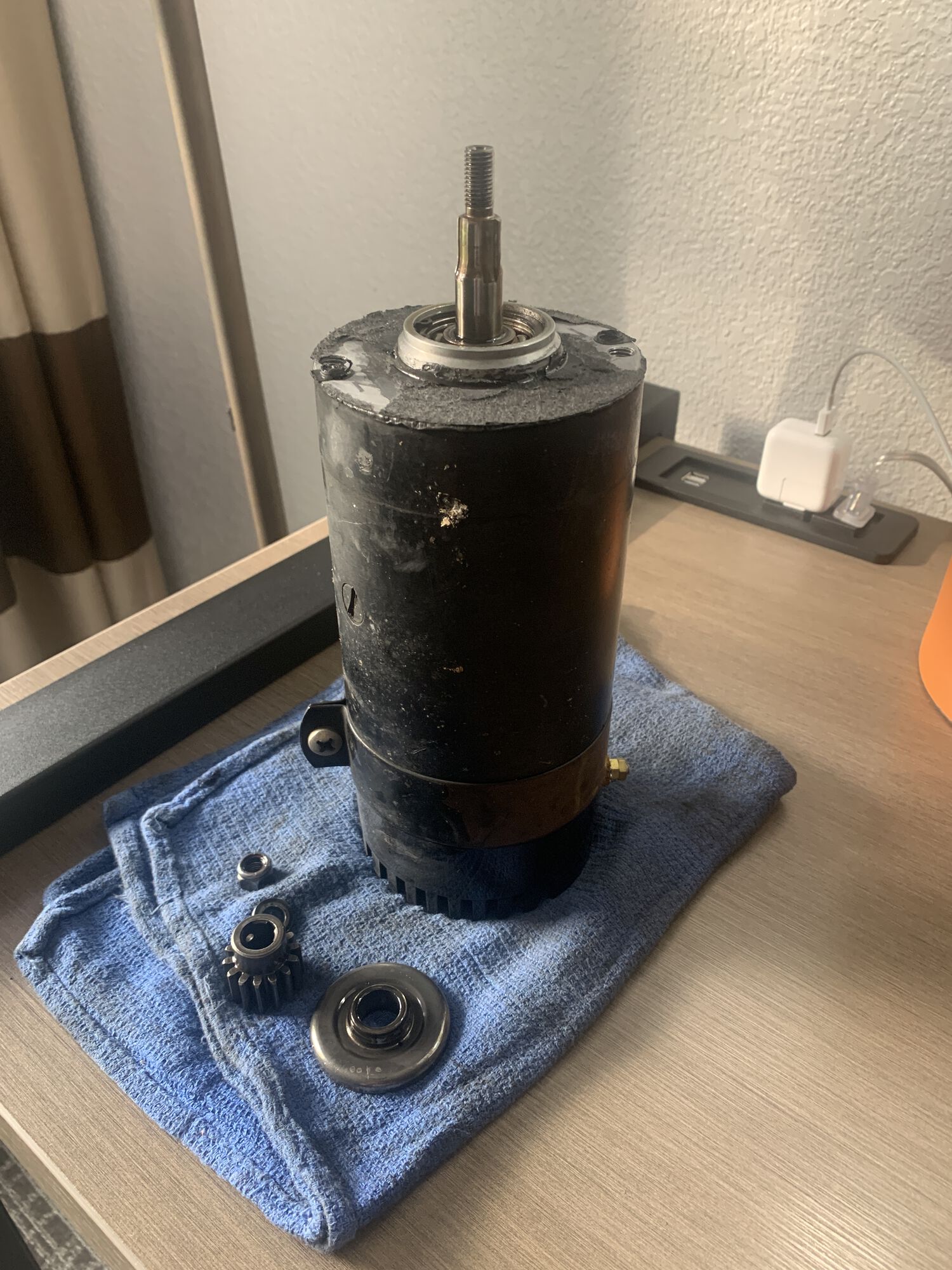 Removing the drive gear and oil slinger from the old generator.