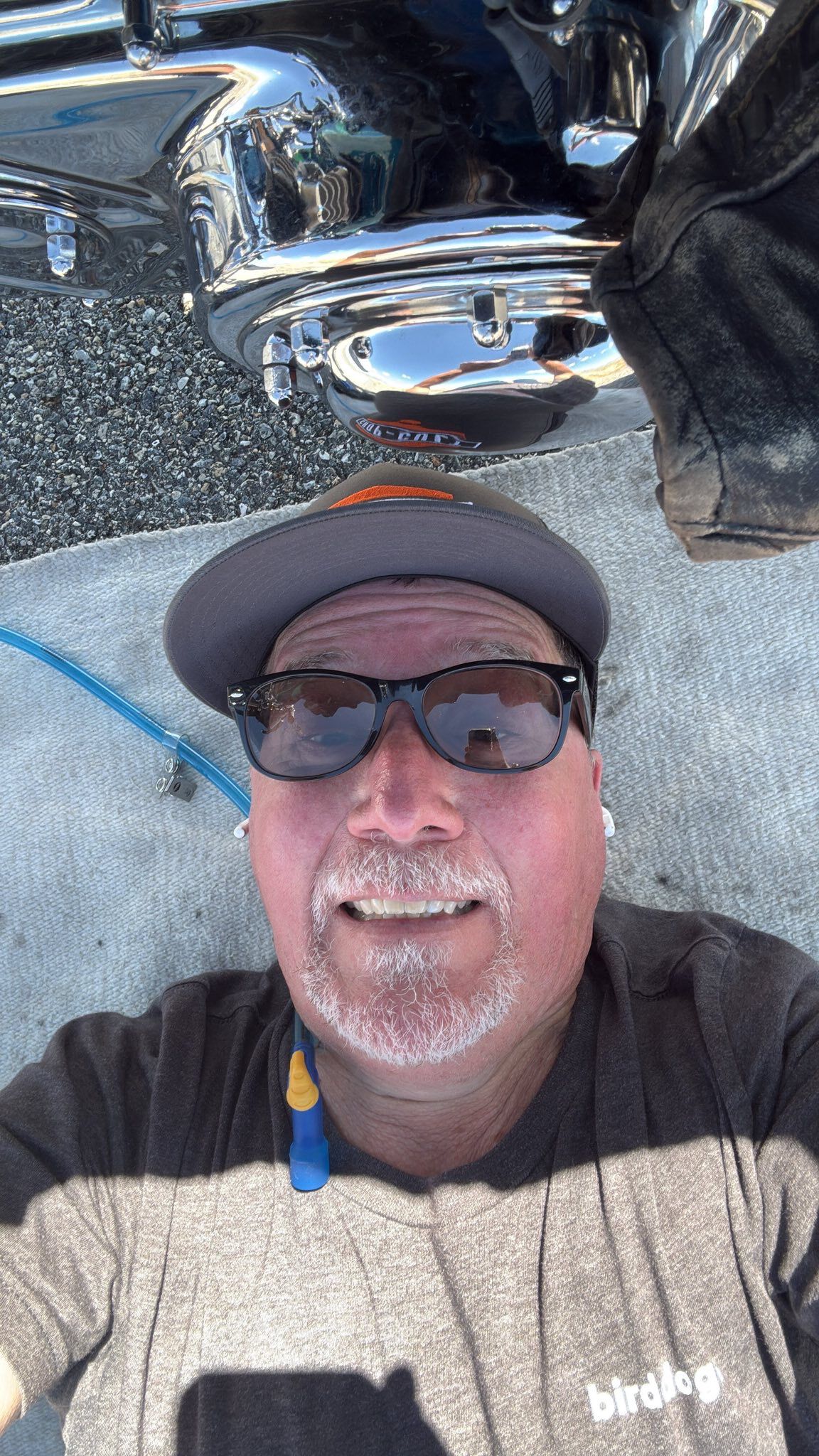 Laying in the sliver of shade beside the bike. Keeping my head cool and sipping water.