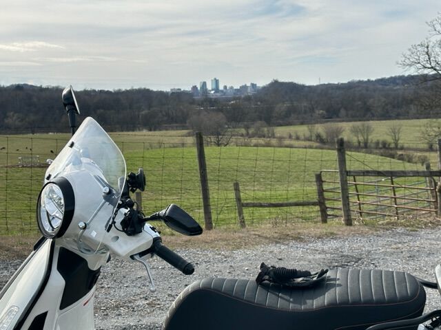 Top of a nearby hill with a distant view of downtown Knoxville & Workds Fair Statisphere.