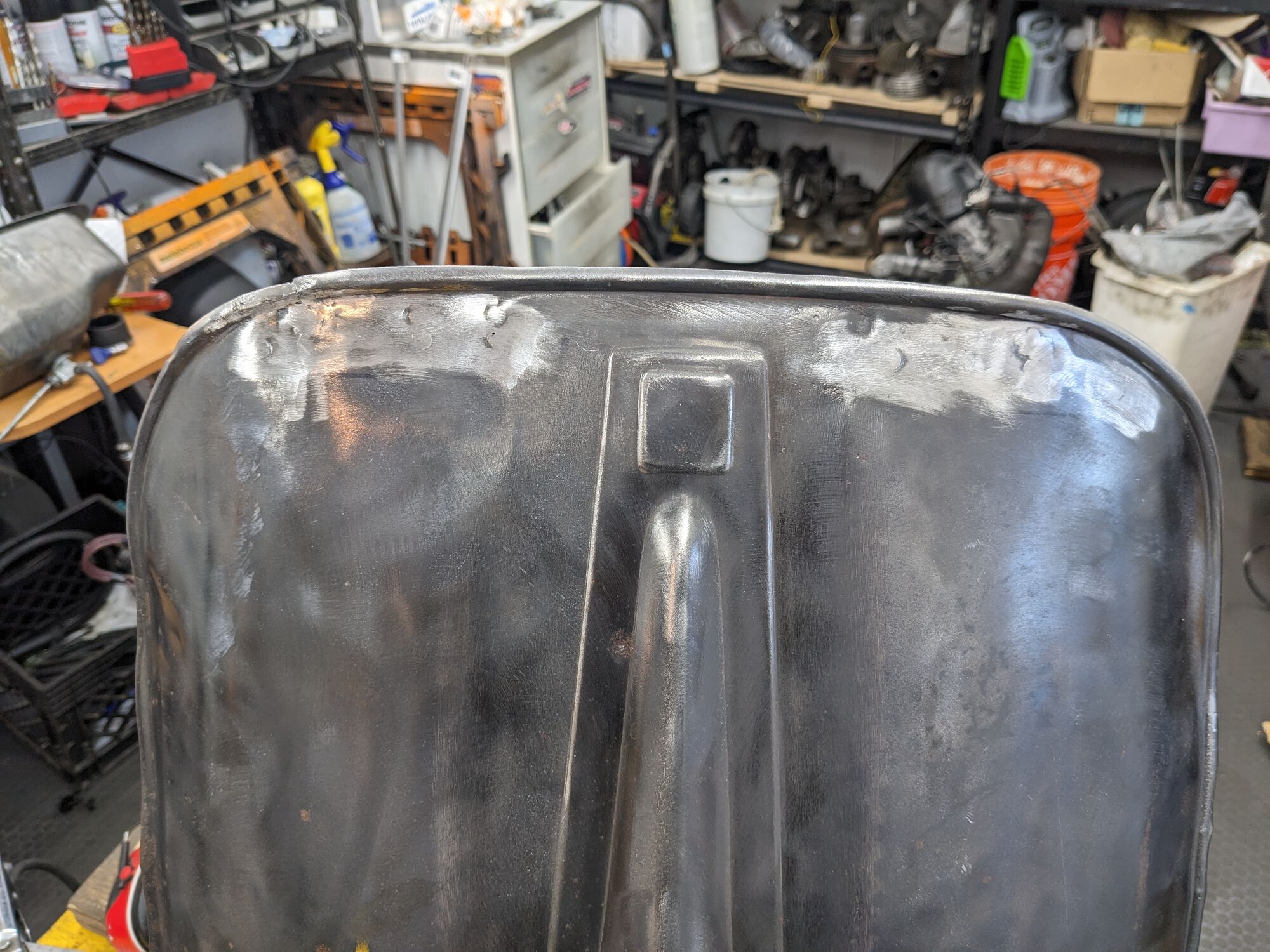 Easier to drill through the front for the plug welds, so I did.