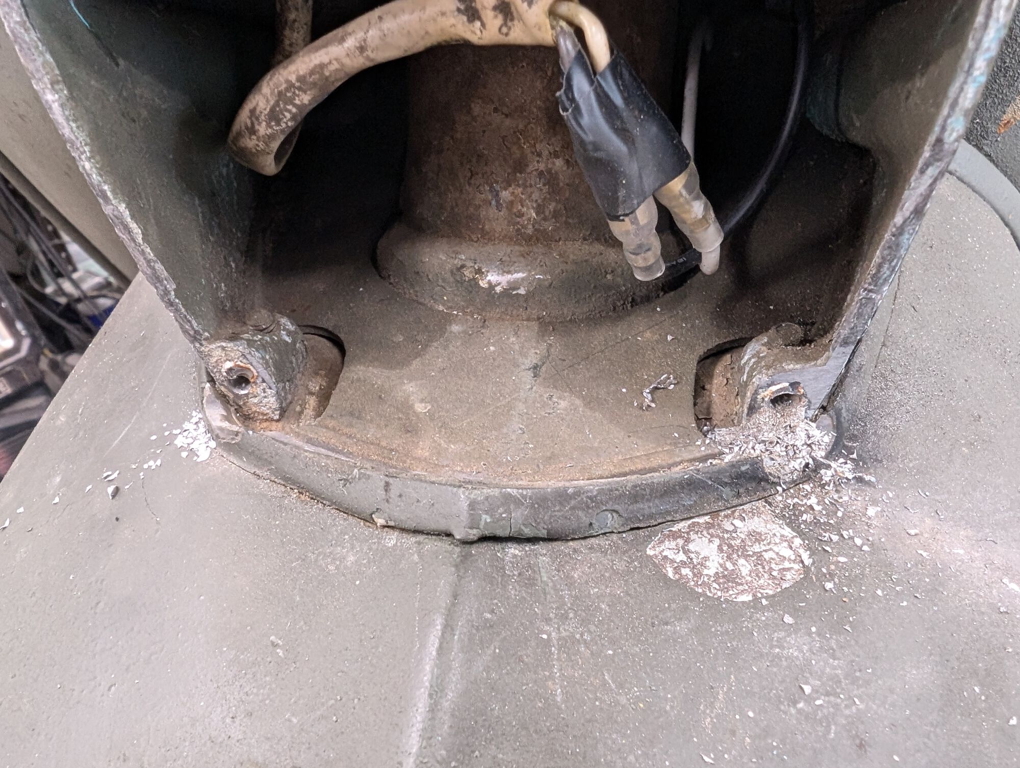 ground flat, drilled, and tapped
