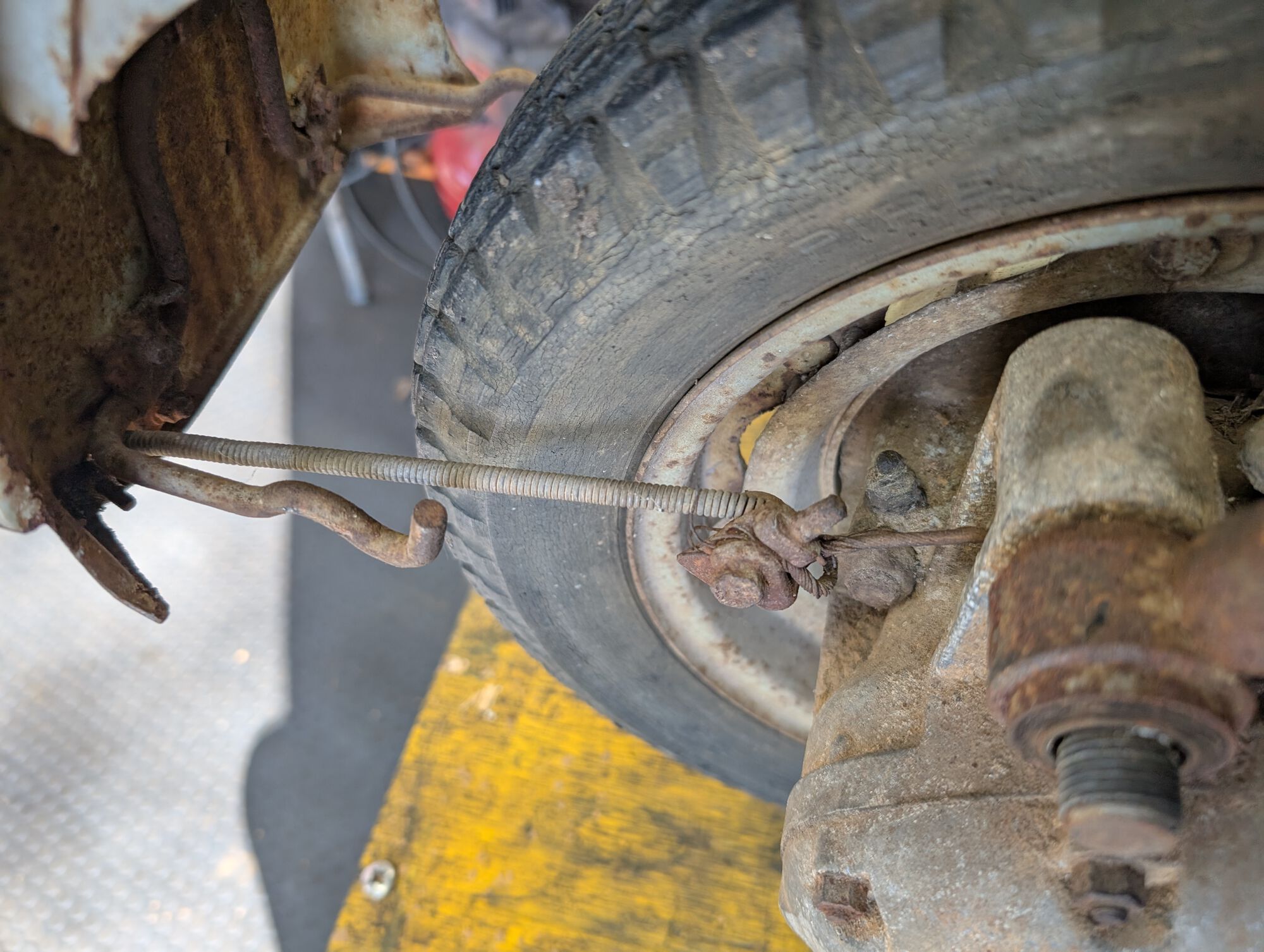 custom rear brake return spring.  In its defense, it worked!