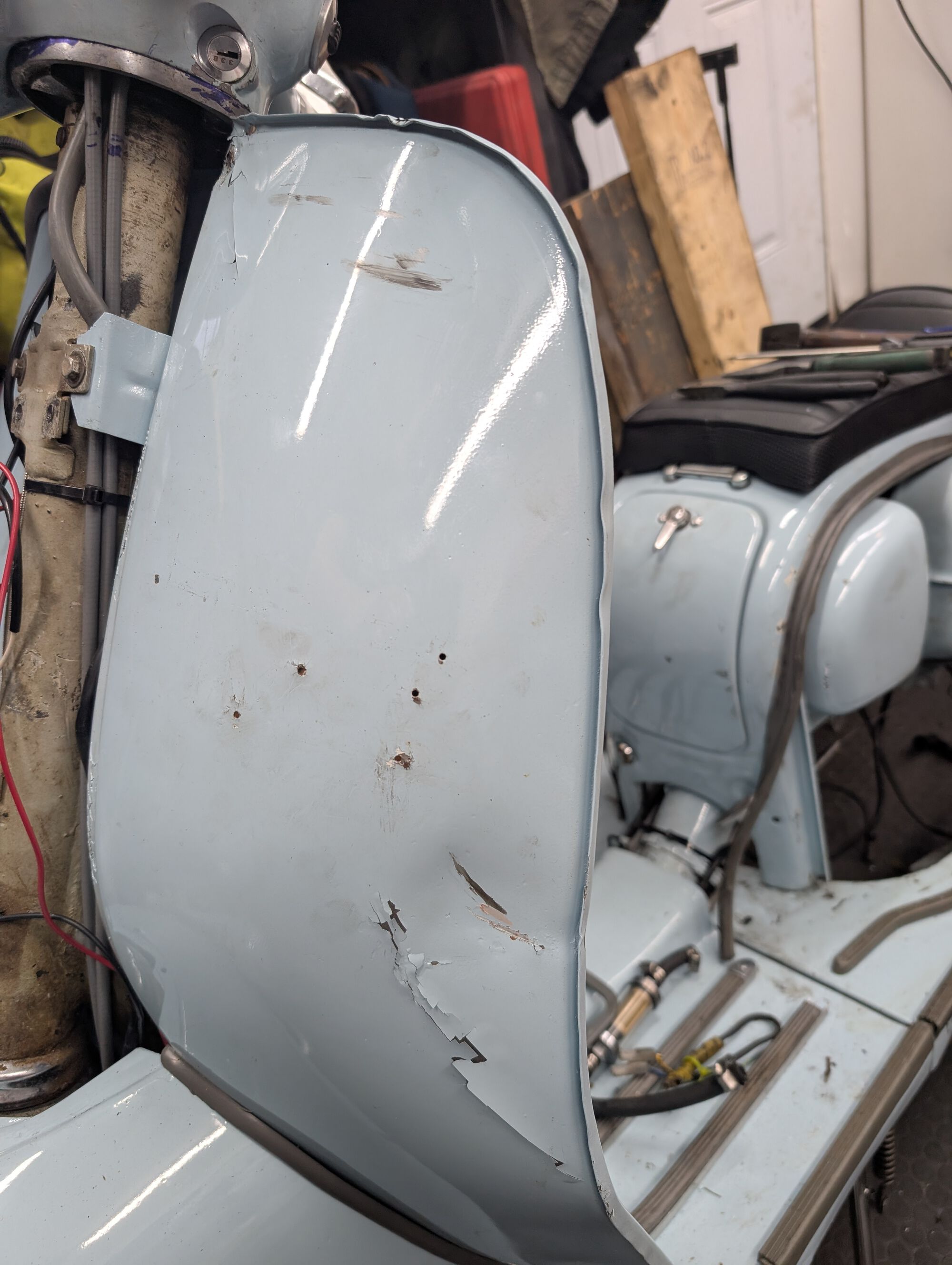 After I bent it roughly back into shape; before panel beating.  Worse than it looks, I promise.