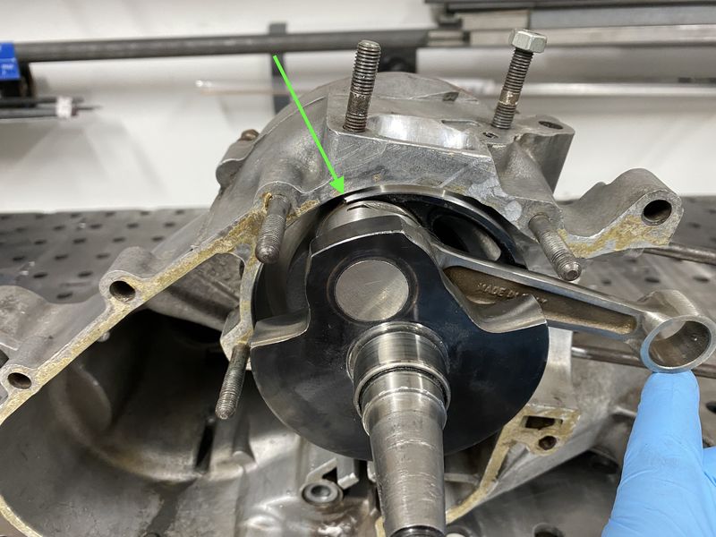 This is the point the inlet opens as the rotary passes the back of the inlet.  Might they mean 6° past the center of the crank pin?  So weird they refer to it as TDC if that is the case