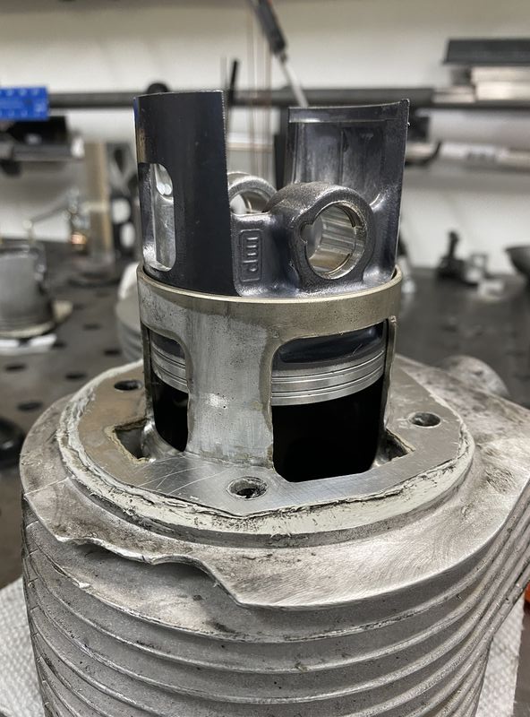 Finally - I used the Charlieman method of install - back side circlip installed, and piston is inserted half way - easy to get rings in & avoid pinching ring pin on bench