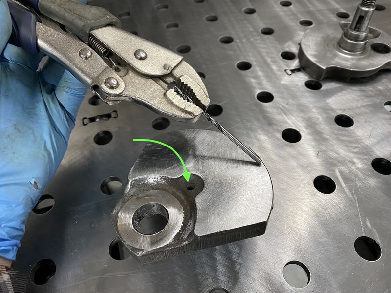 The cranks all have this center hole - which I can use to center a shank that will run through a plate & bearing before attaching drill