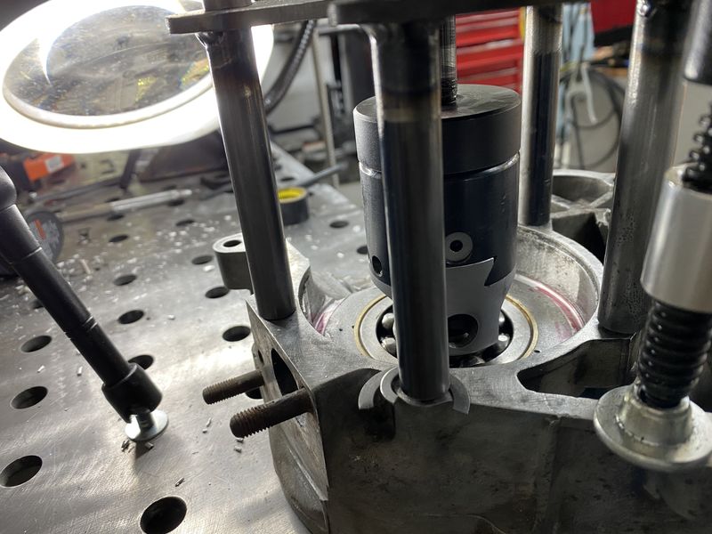 "precision" shims under the leg on the left.  You can see I used red sharpie to see where I was hitting and even things up.  worked quite nicely.