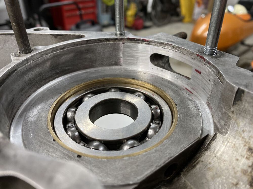First effort at cutting the pad.  It was interfering badly with the crank cheek prior.  Some nasty porosity was exposed when I took the cleaning cut.
