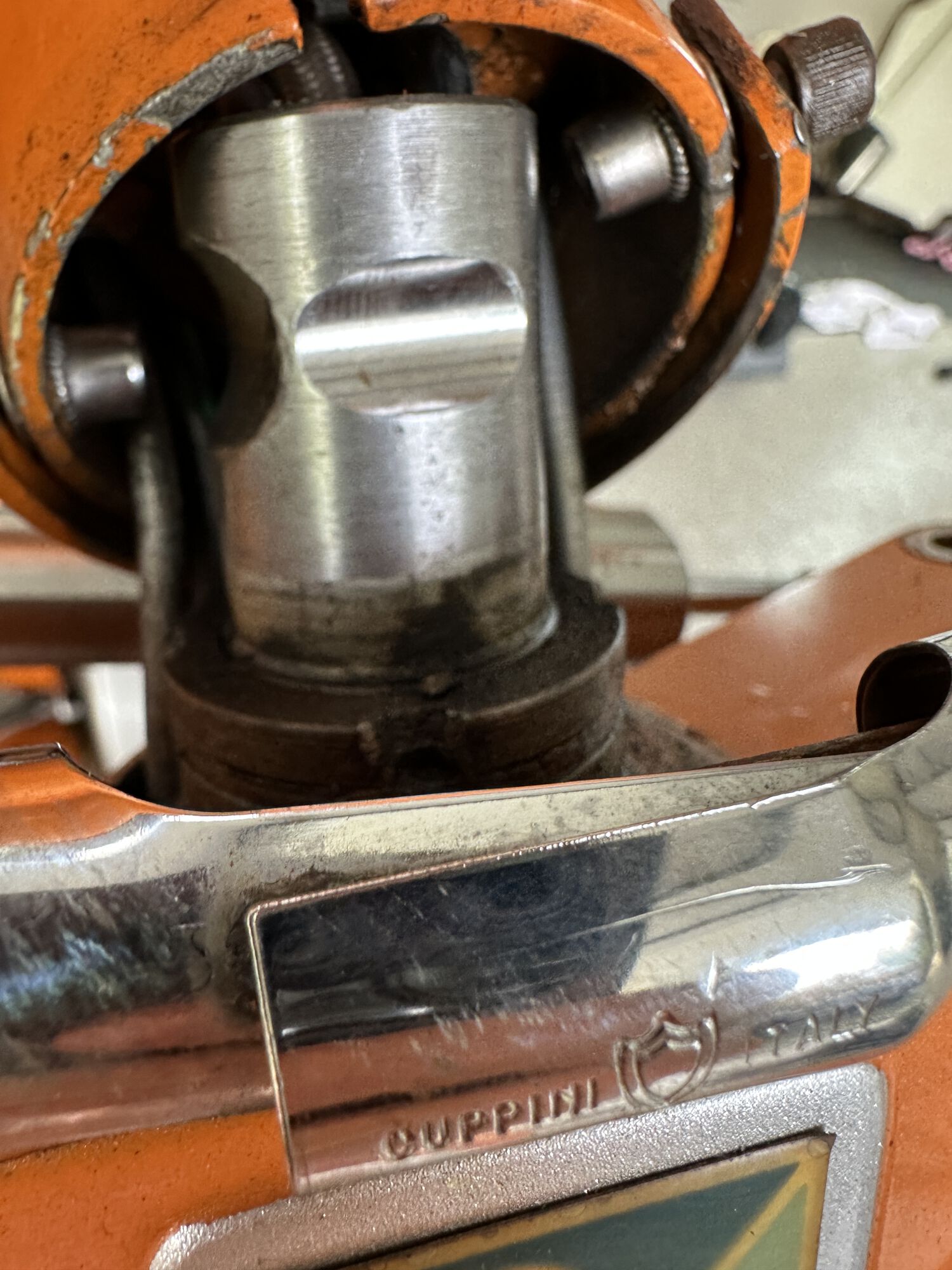 You can see a little wear on the slot edges - and it's up toward the top half - due to slight misalignment of bolt to fork slot.