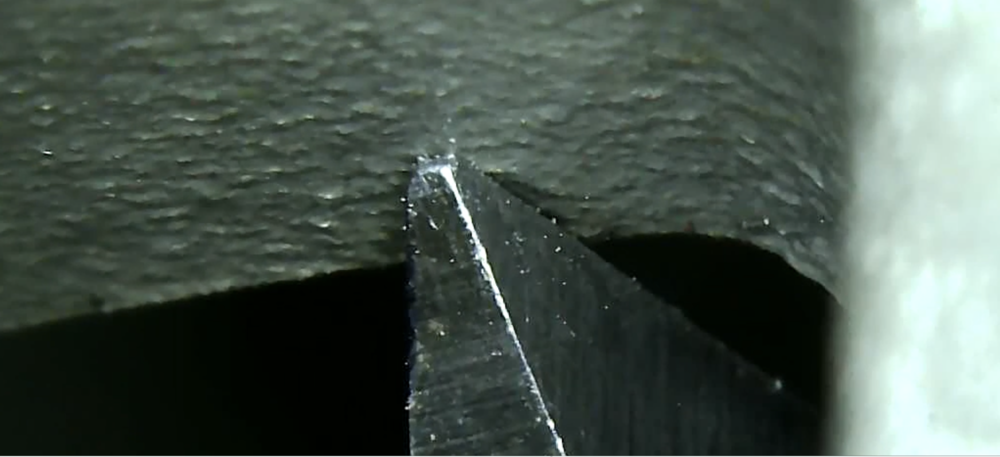 Same as previous - but the caliper sitting about 1/8" deeper in the port.  Could not "feel" this at all - and was surprised by the variation when I put a camera on what I was doing.