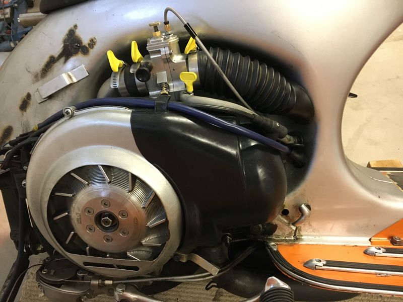 Carb now nicely installed - with spacer and adapter for bellows.  Rad tube actually goes about 60MM inside of bellows - keeping them from wanting to collapse.  Seems to be working nicely.