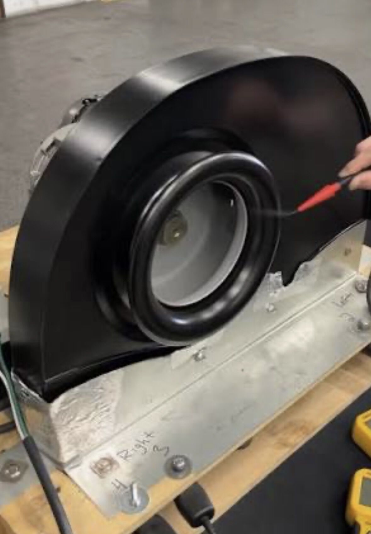 This kinda bell mouth for air entering with tighter gap to blade tips would probably have a good effect.