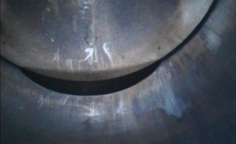 Camera has long neck - hard to get much more of the piston in shot than this