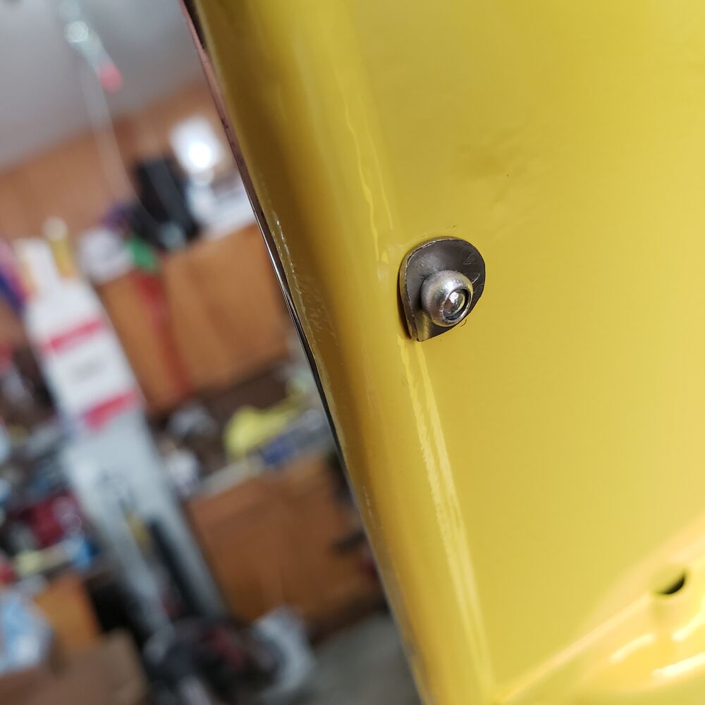 Bent the washers so they fit snug.