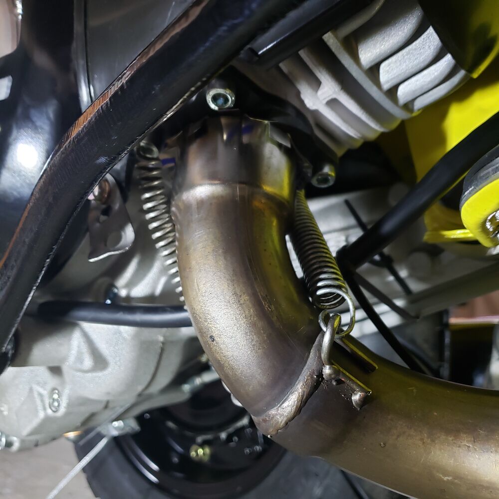 Not sure which sides the springs should be on.  They also keep the shifter cable off the exhaust so yeah!!