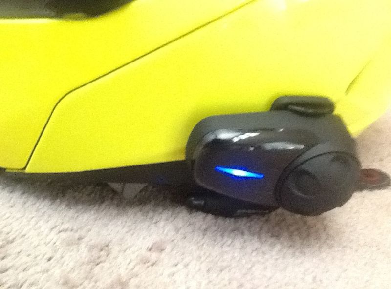 Sena unit showing clip (also showing placement does not interfere flip down sun shield controls)