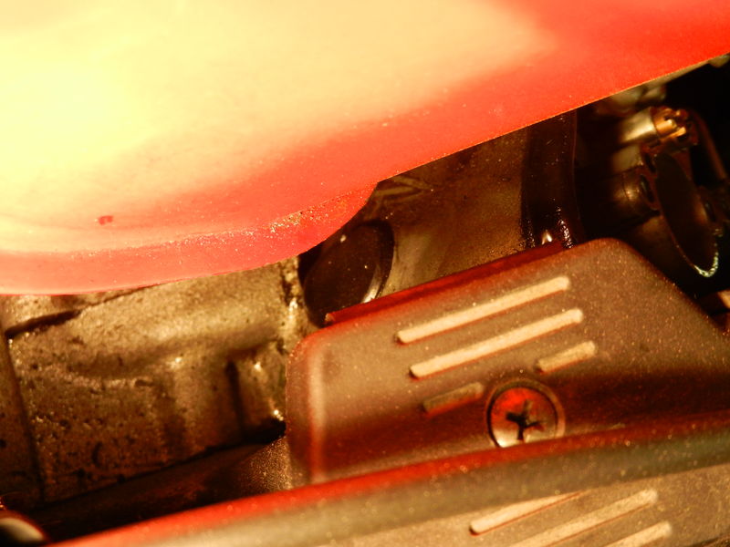 rubber plug at back of airbox