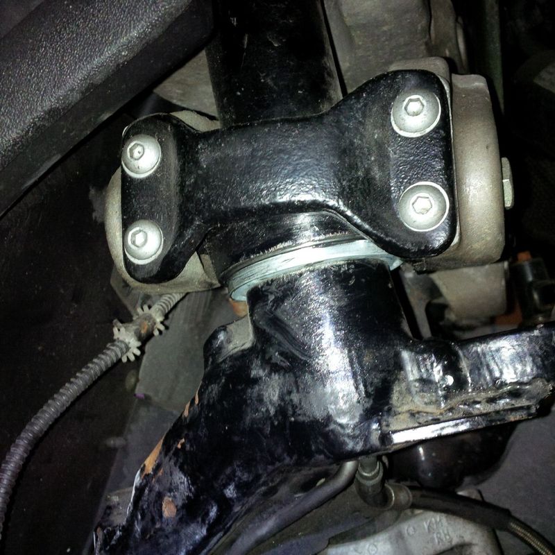 You can see the new seal at the bottom of the steering yoke..does this look a bit thicker than the original?