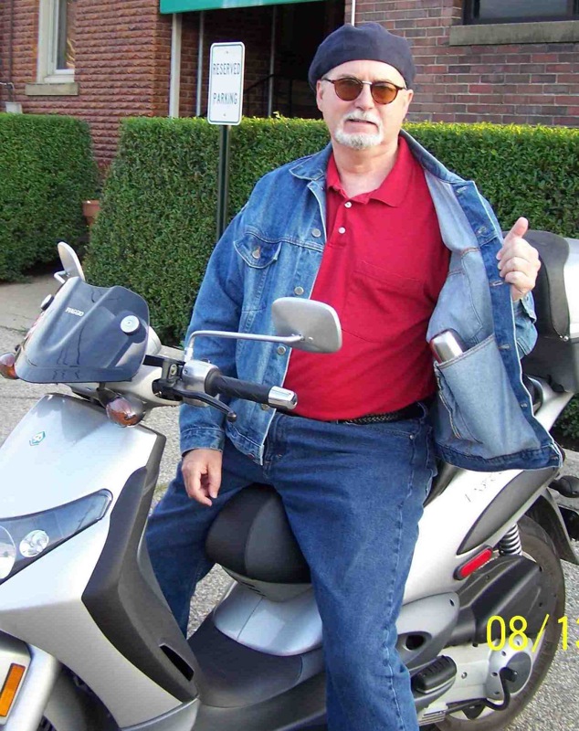 Modern Vespa Anyone know of a cup holder?